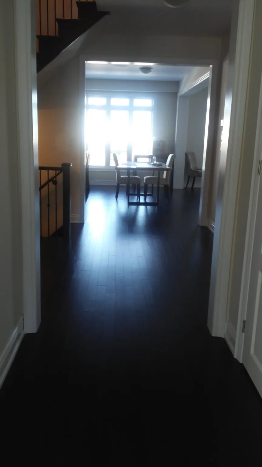 Clean hardwood floors prepared for move-in in a Pickering home