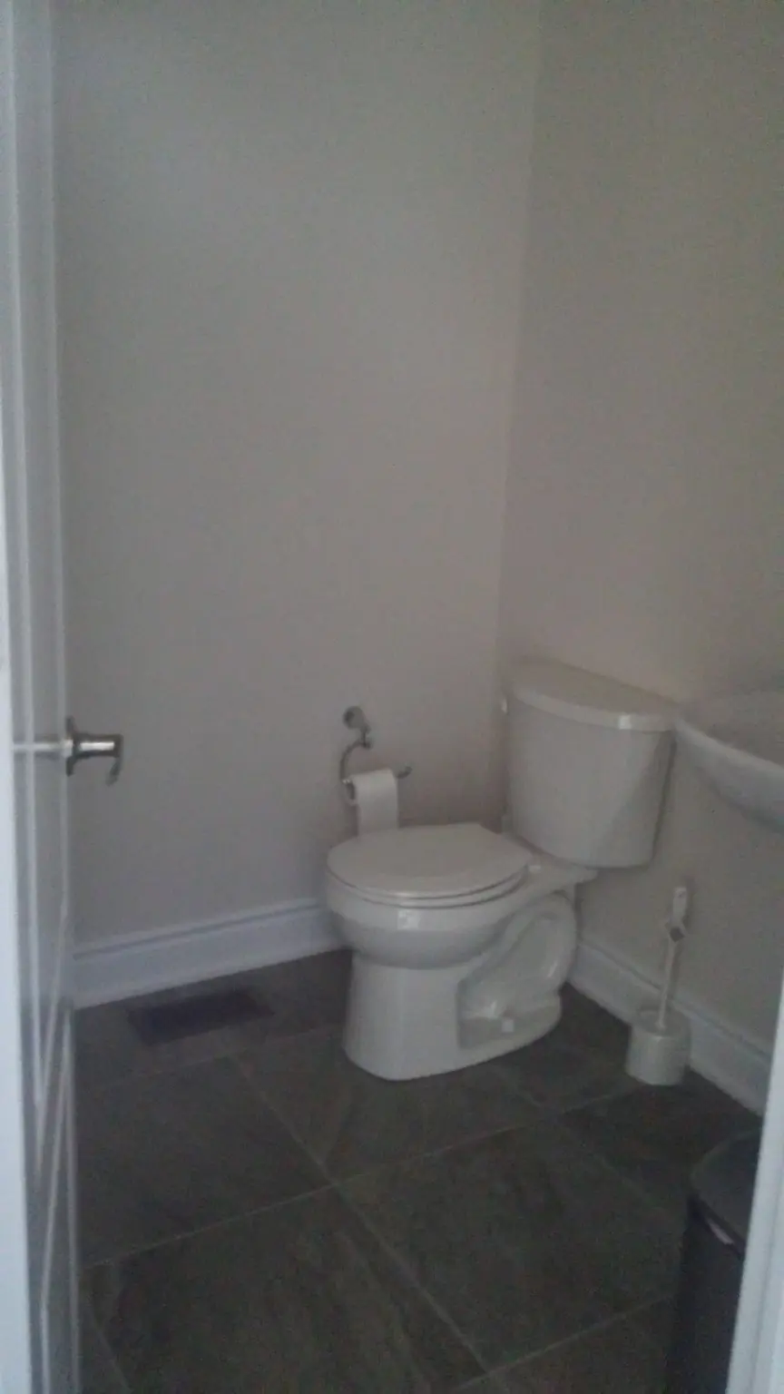 Clean powder room during weekly recurring cleaning service in Pickering