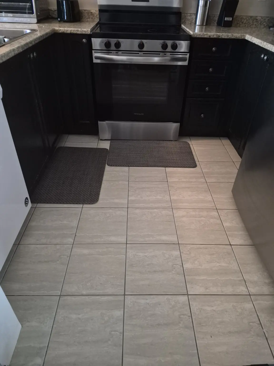 Clean kitchen tile floor after professional cleaning in Pickering