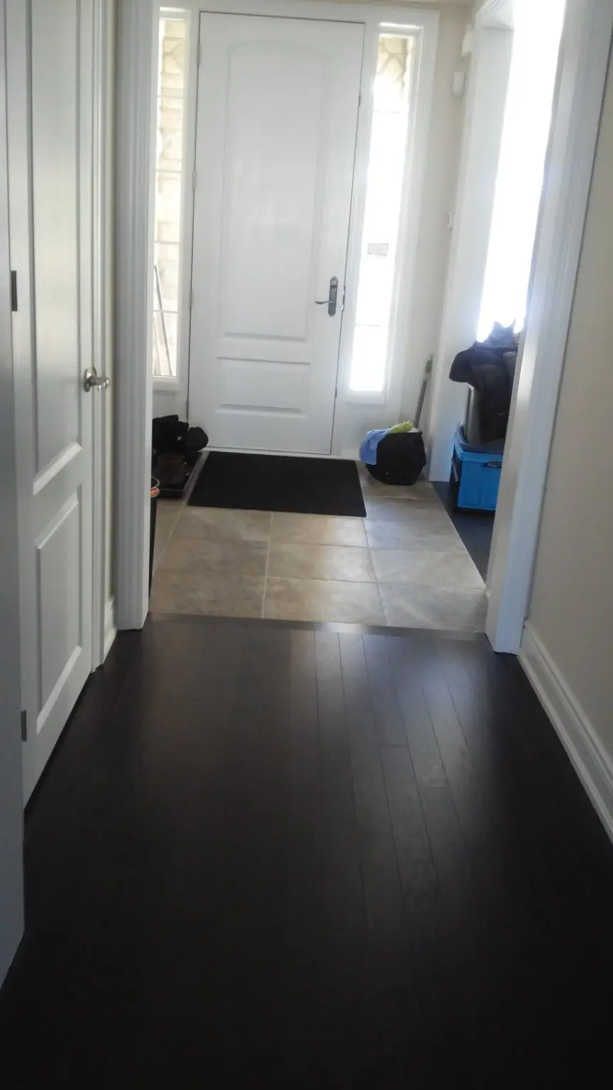 Clean entrance foyer during weekly recurring cleaning in Pickering