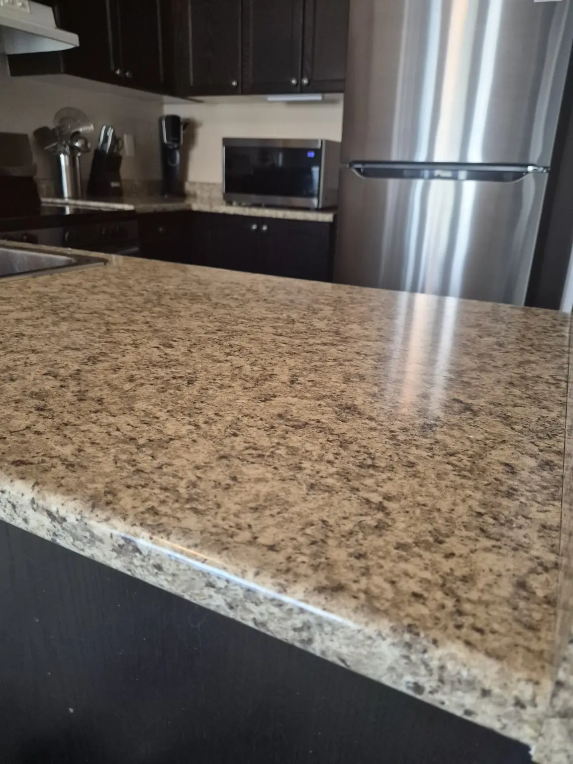 Clean and polished kitchen countertop after deep cleaning service in Pickering