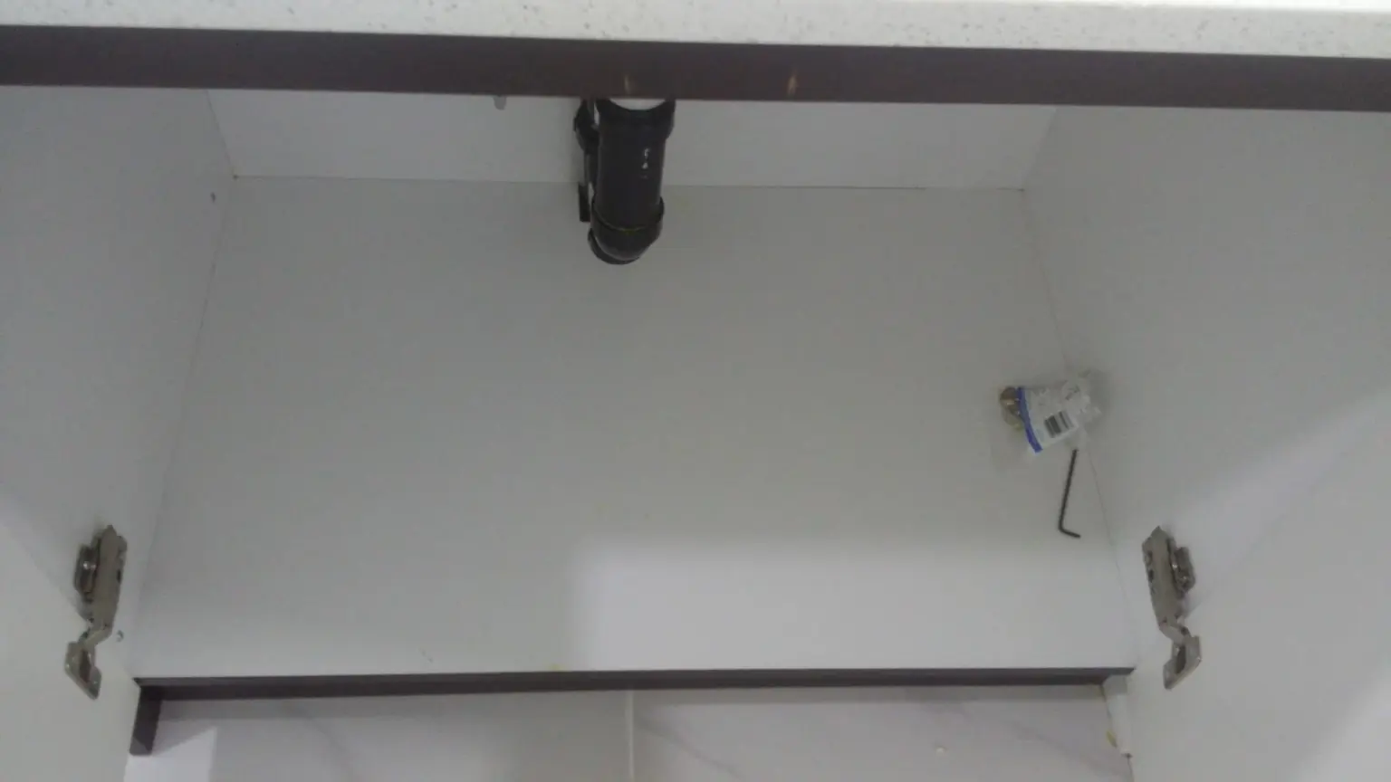 Clean cabinet interior after basement renovation cleaning in Ajax